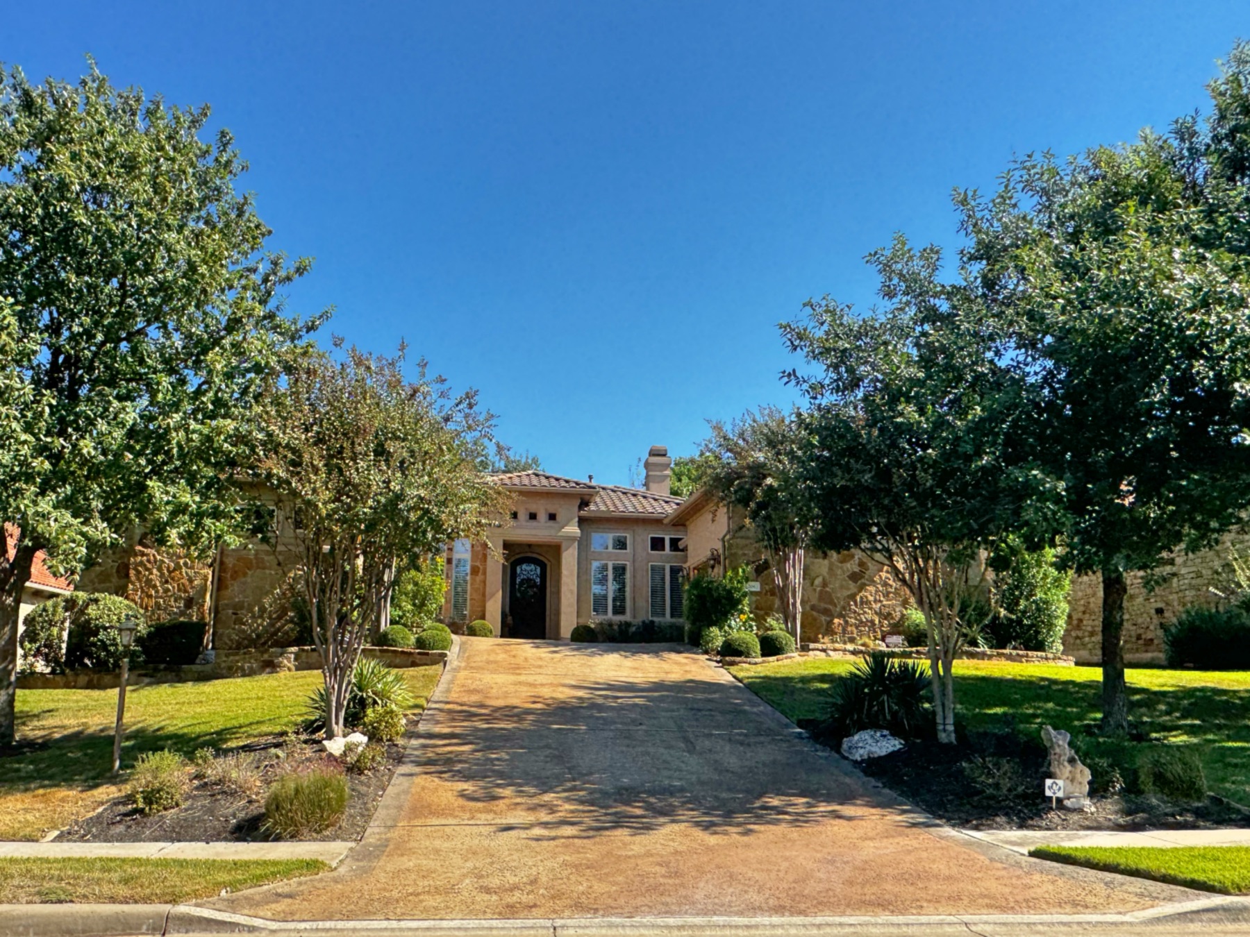 luxury home flintrock at hurst creek stone and stucco