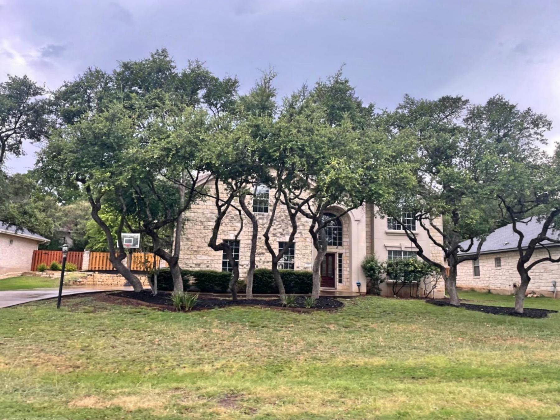 lohmans crossing estates two story brick home in lakeway