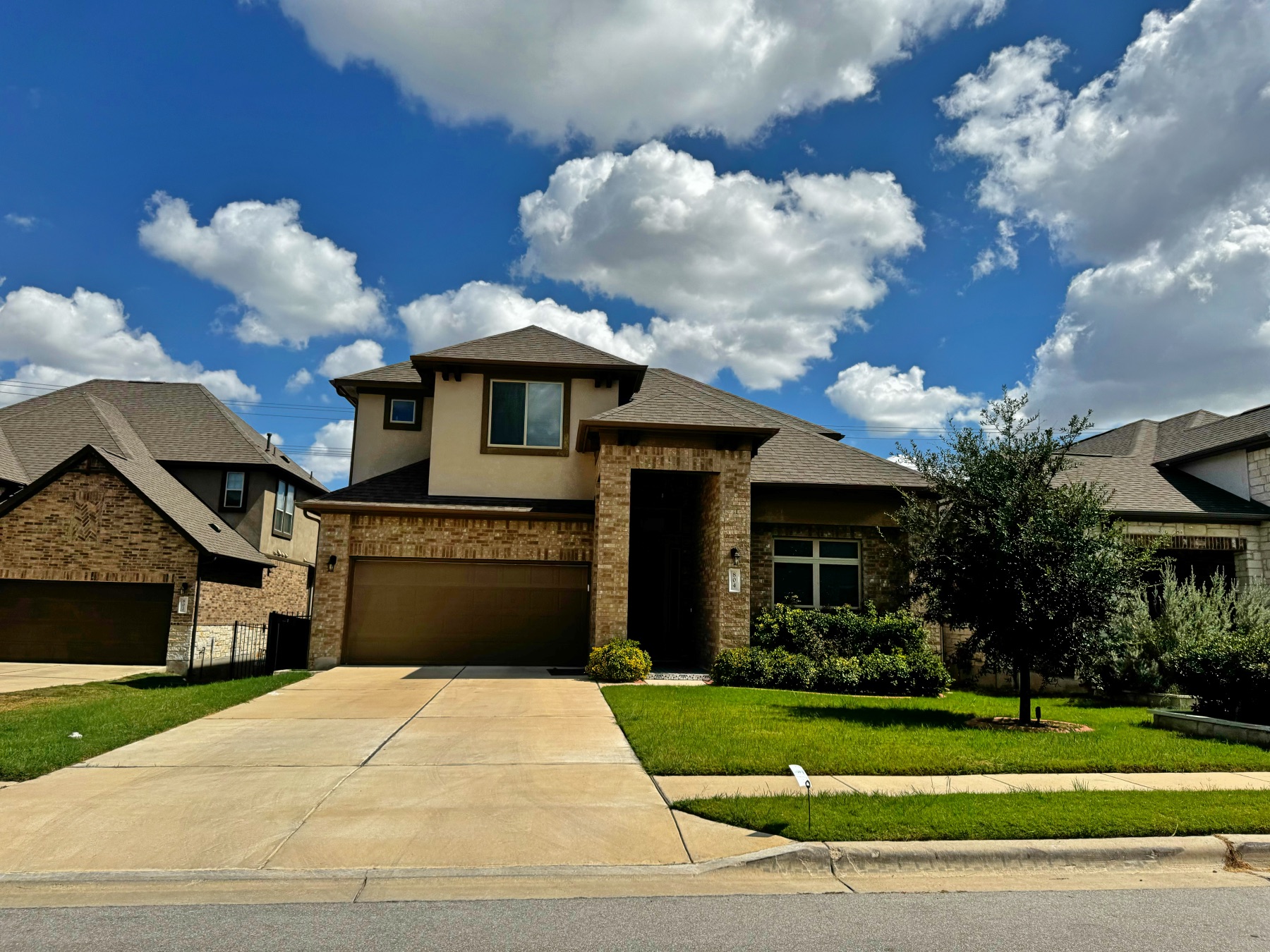 Three Points Cedar Park two story stucco brick home