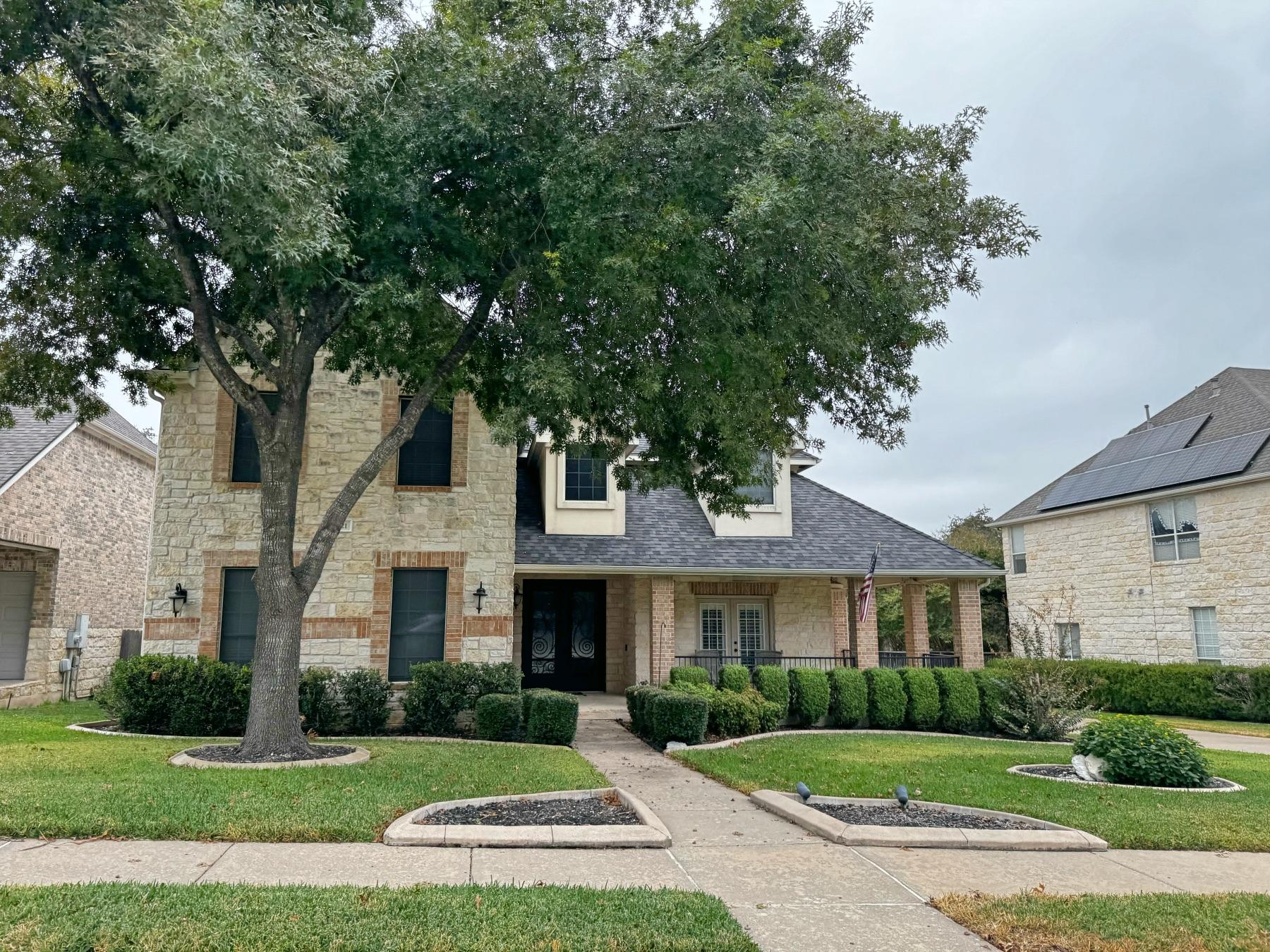 Lake Forest Round Rock luxury home with porch