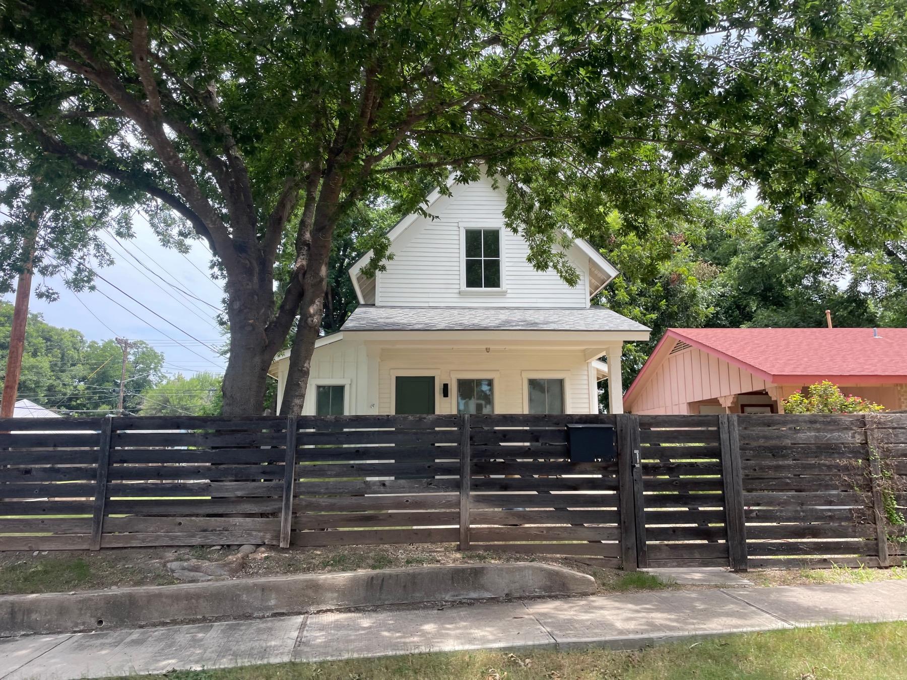 driving park East Austin home on corner lot
