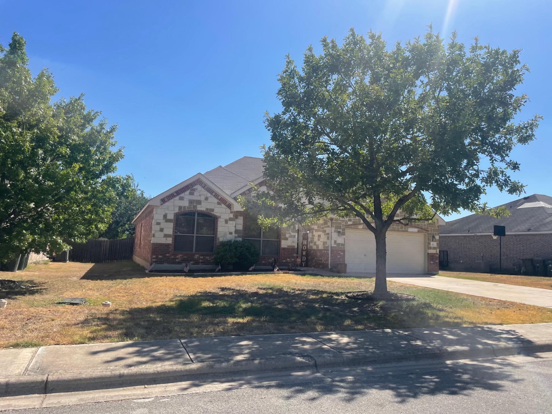 woodlands park one story brick stone home Kyle tx