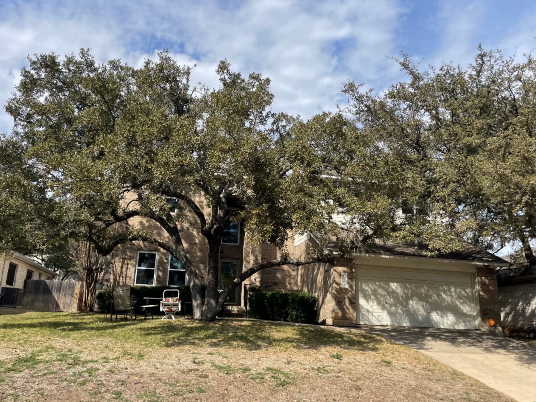 woods of legend oaks two story brick home Austin tx 78749