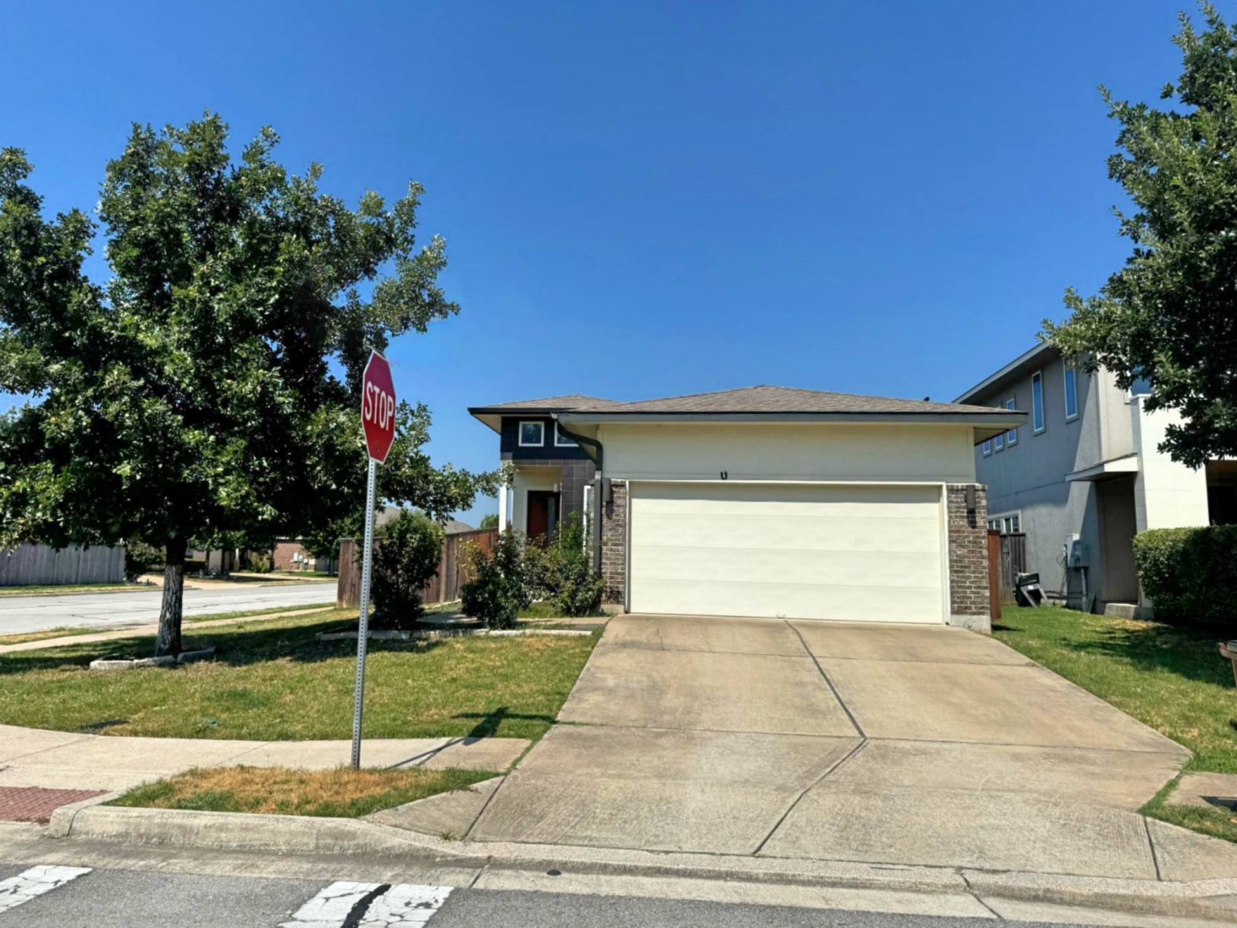 home on corner lot Addison Austin TX