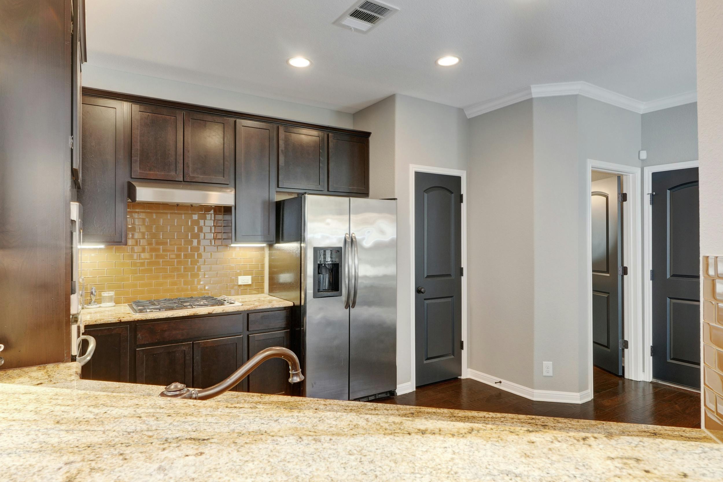 7517 Colina Vista A Austin kitchen with gas cooktop and pantry