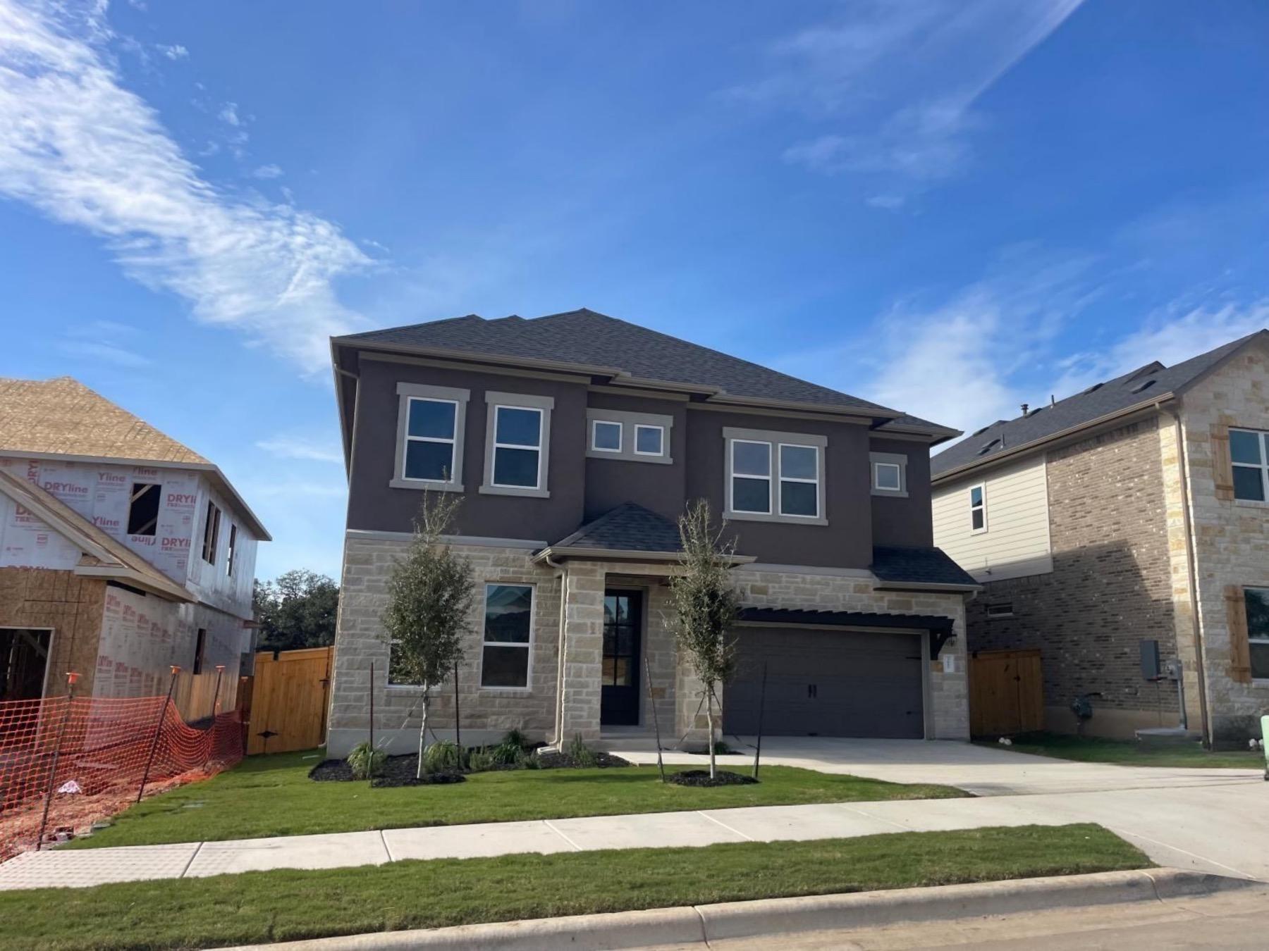 Edgewood stone stucco home leander tx