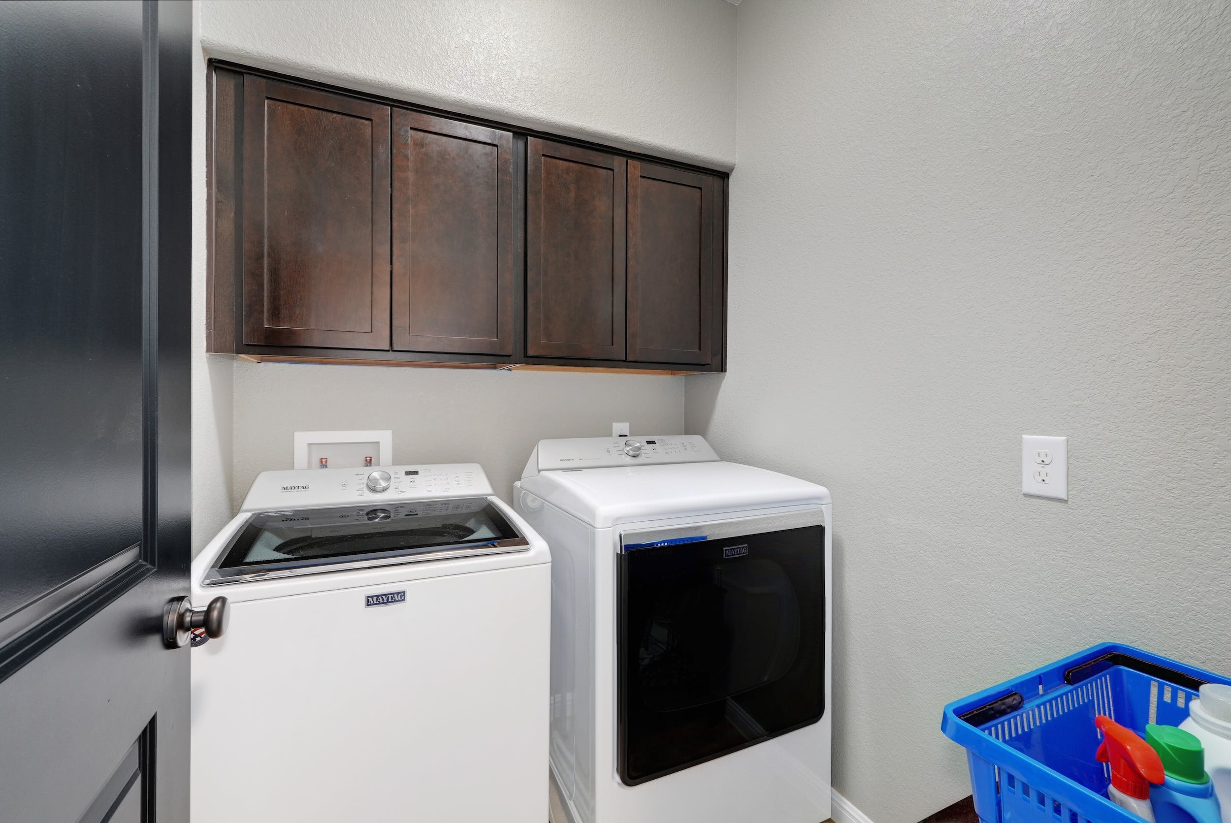 7517 Colina Vista A Austin upstairs laundry room with storage