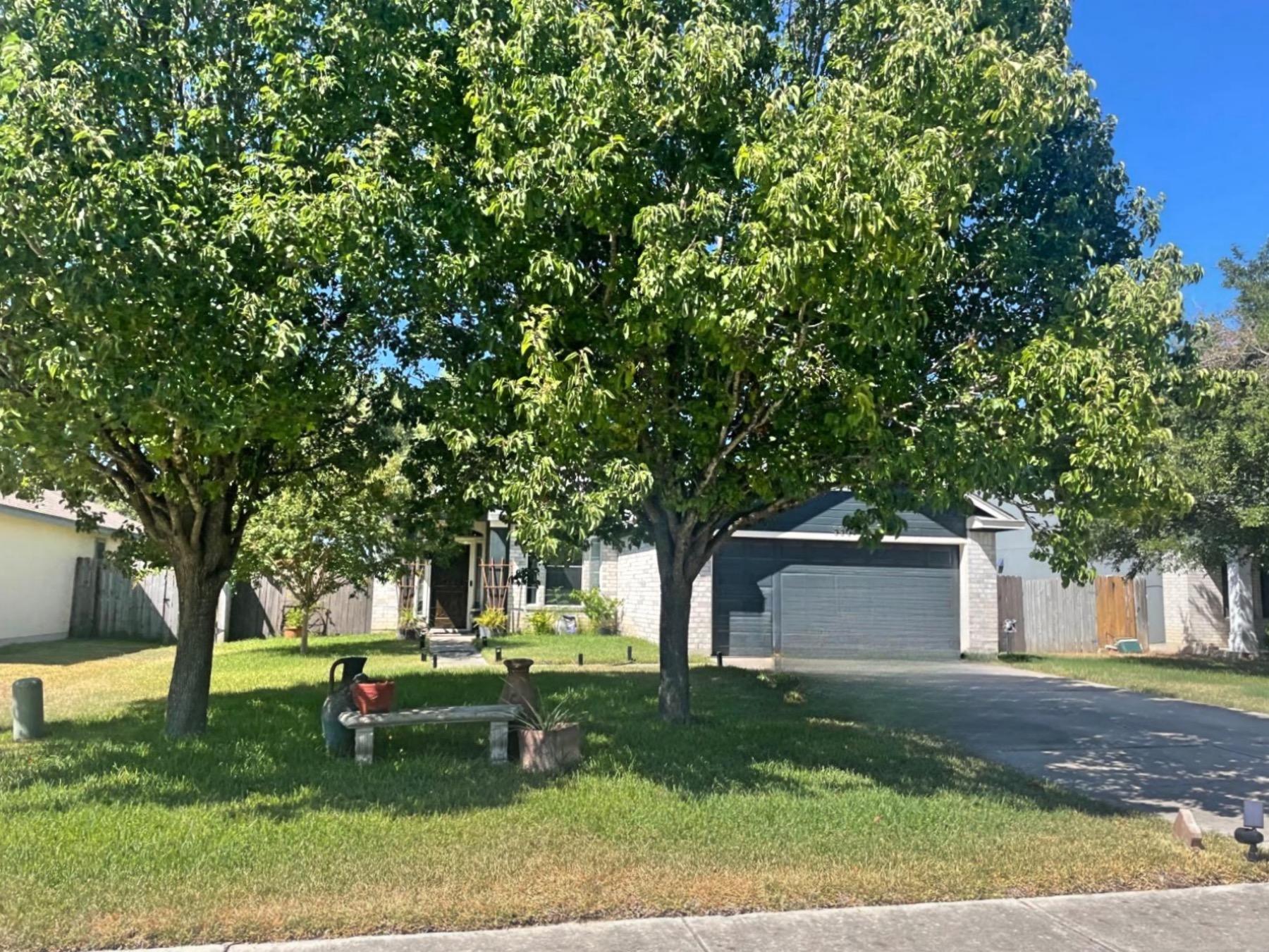 north trails home with grey garage Kyle tx 78640