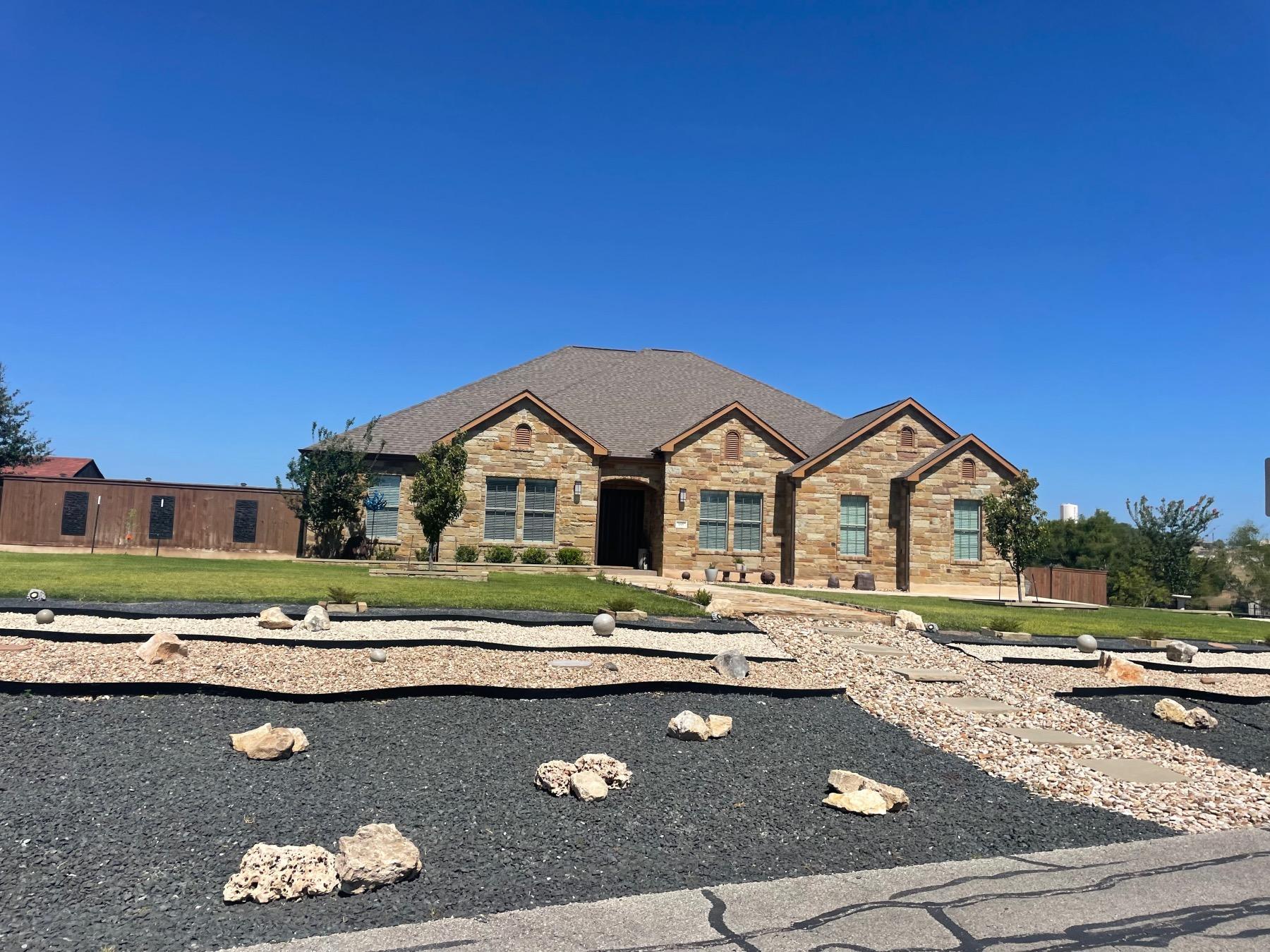 woodbrook home xeriscaped yard buda