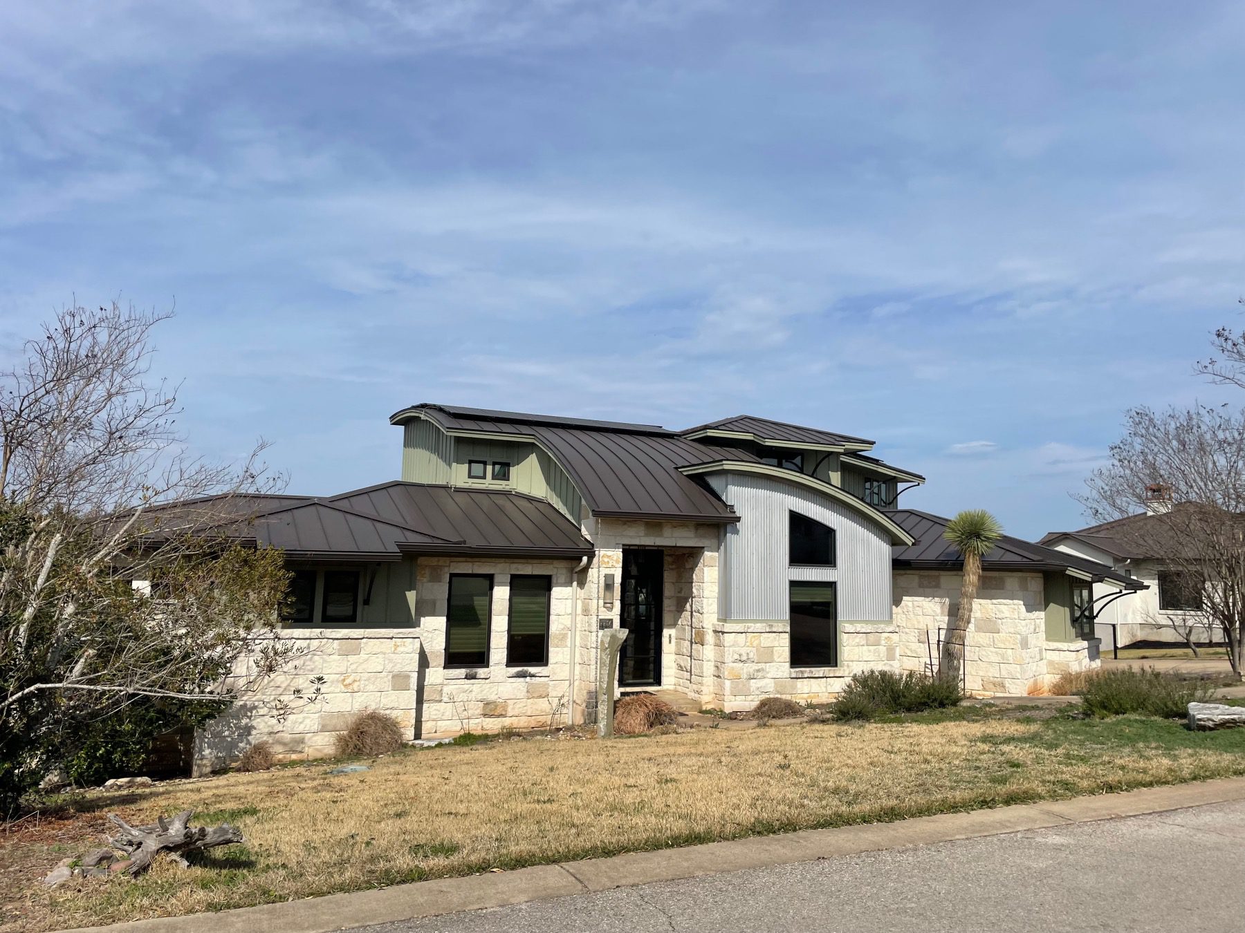 overlook estates home with curved roof Austin tx 78736