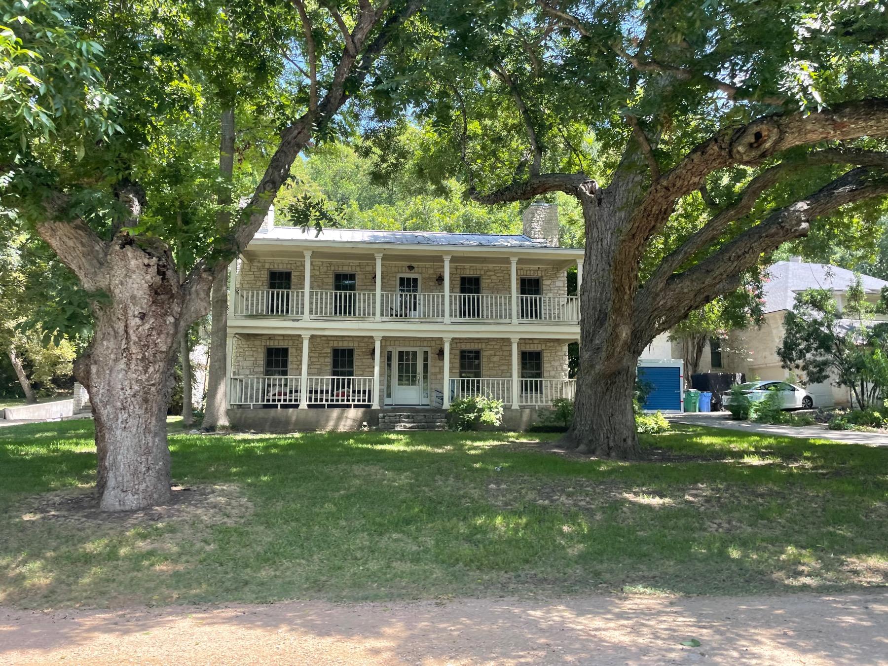 rivercrest luxury home double porches Austin texas
