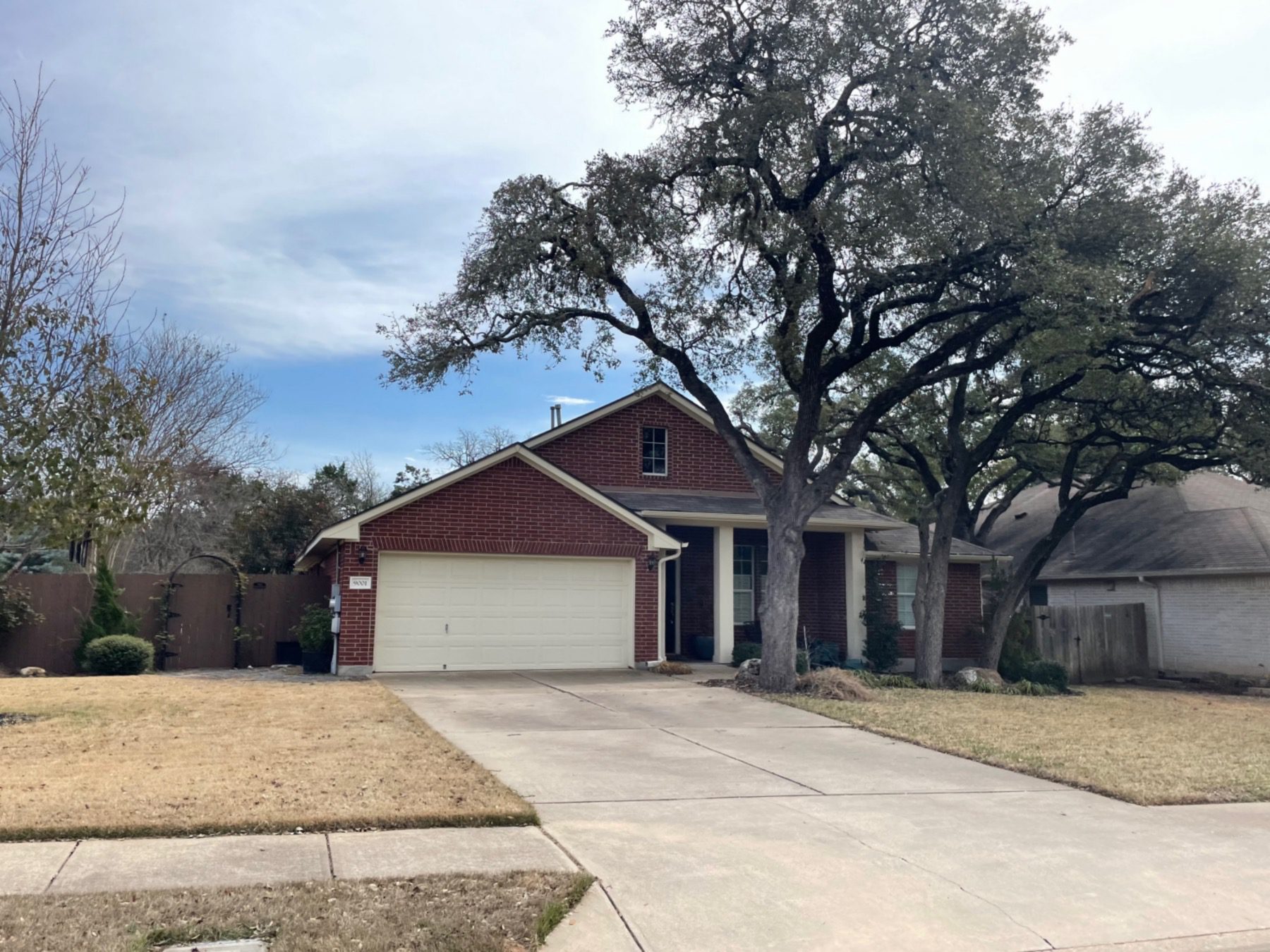deer haven one story brick home mature tree Austin texas 78749