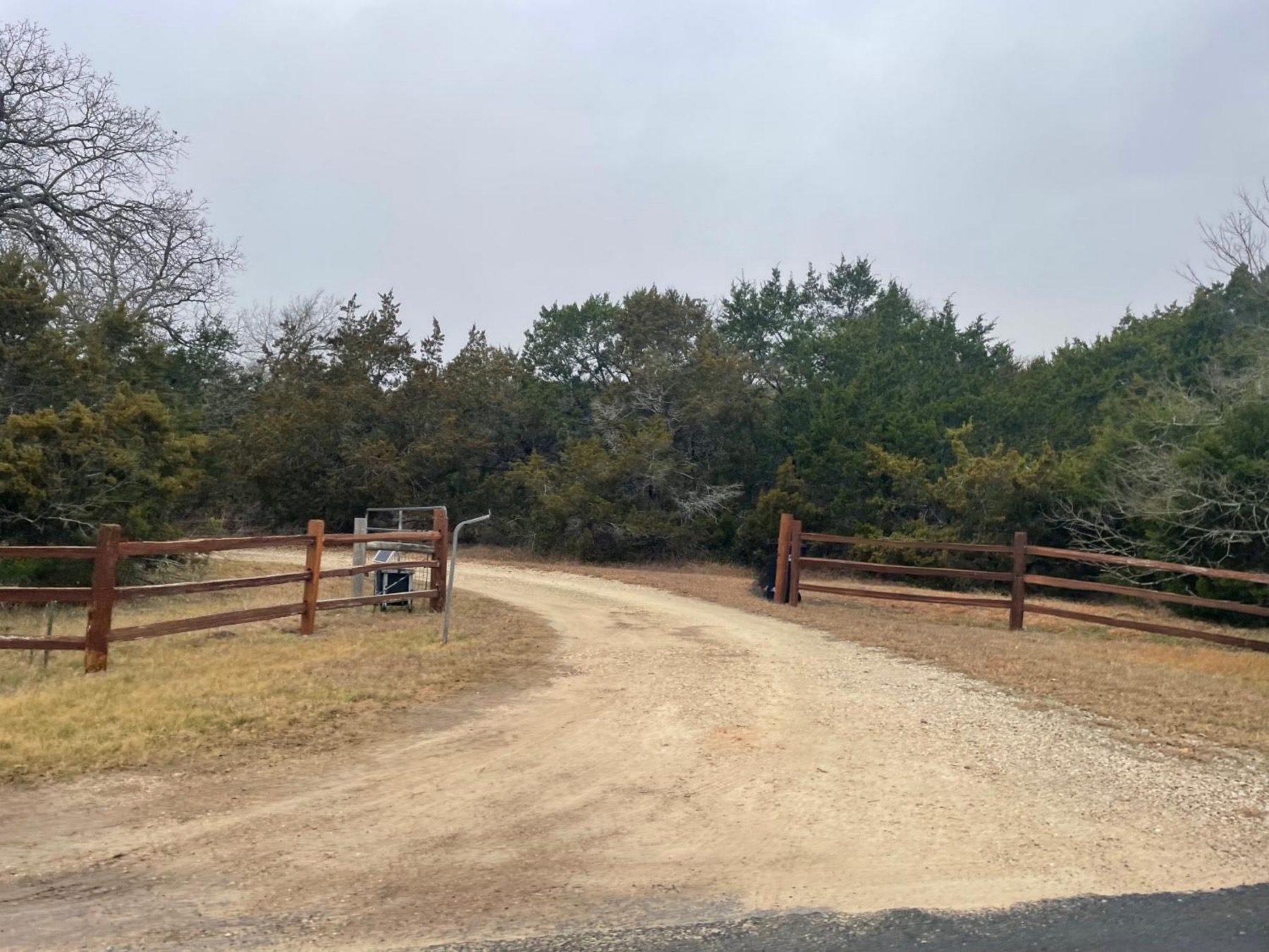gated home dirt driveway cedar hollow crossing Georgetown