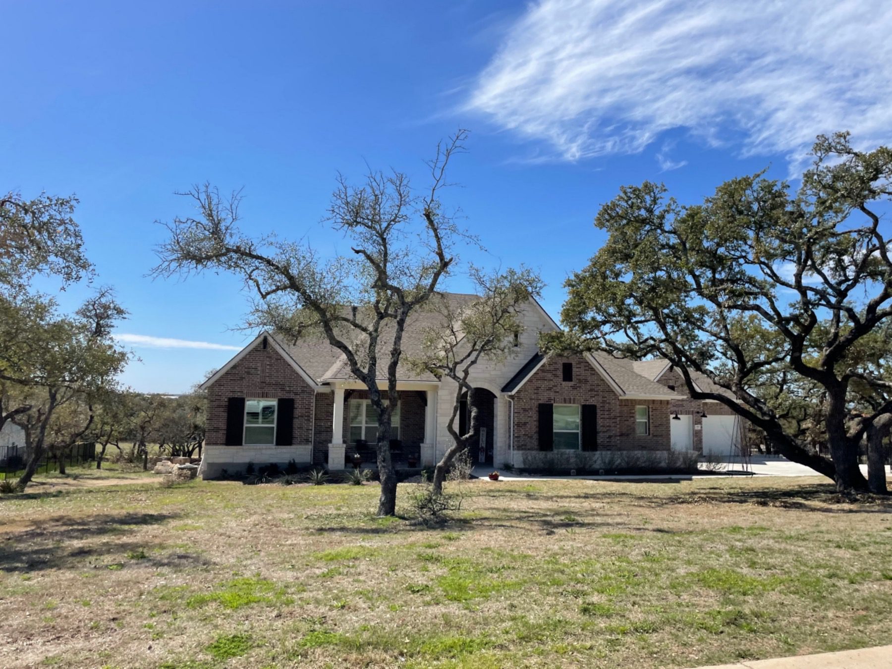 estates of Sawyer ranch home with mature trees Austin texas 78737
