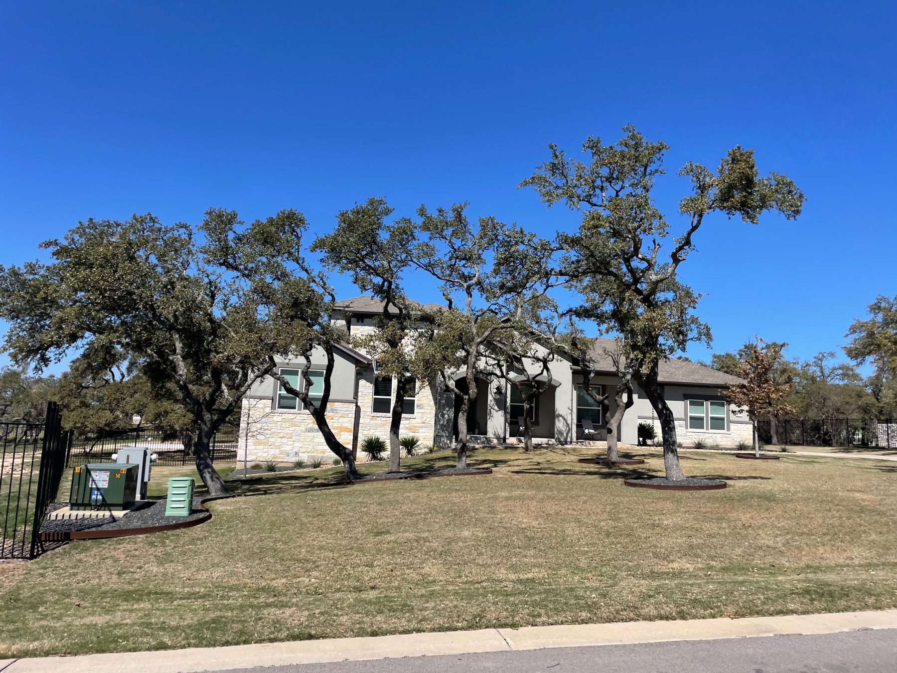 estates of Sawyer ranch home with mature trees Austin tx 78737