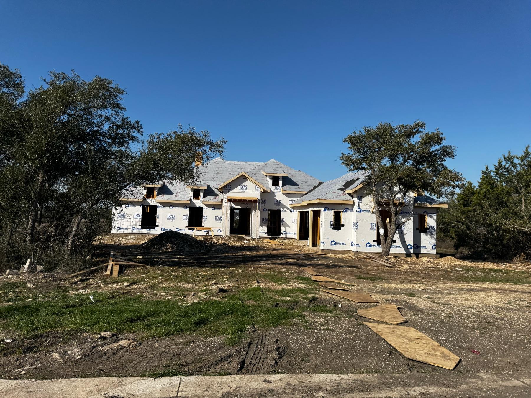 New construction home at Daniels Mountain Georgetown TX during framing stage