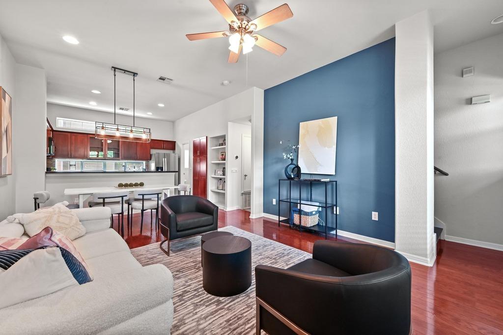 open concept second floor living area in Austin TX condo with professional real estate photography