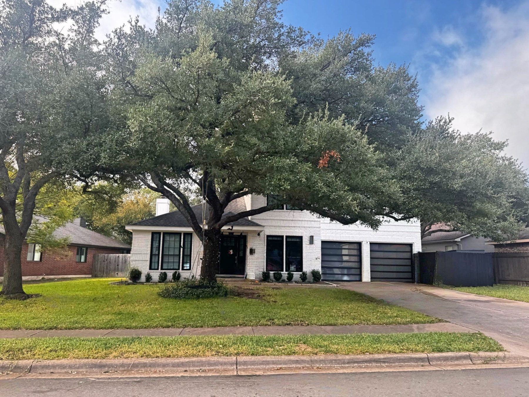 Circle C home white painted brick Austin