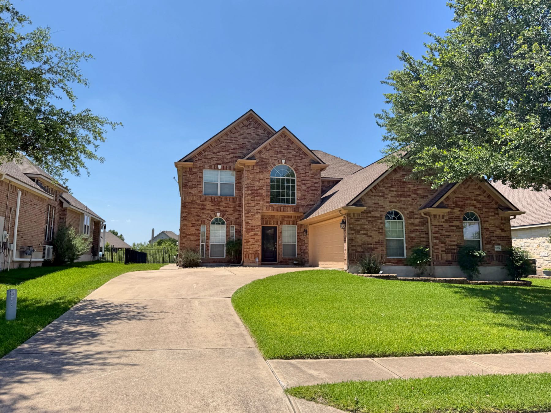 two story brick home in Fairways at Blackhawk, Pflugerville neighborhood guide