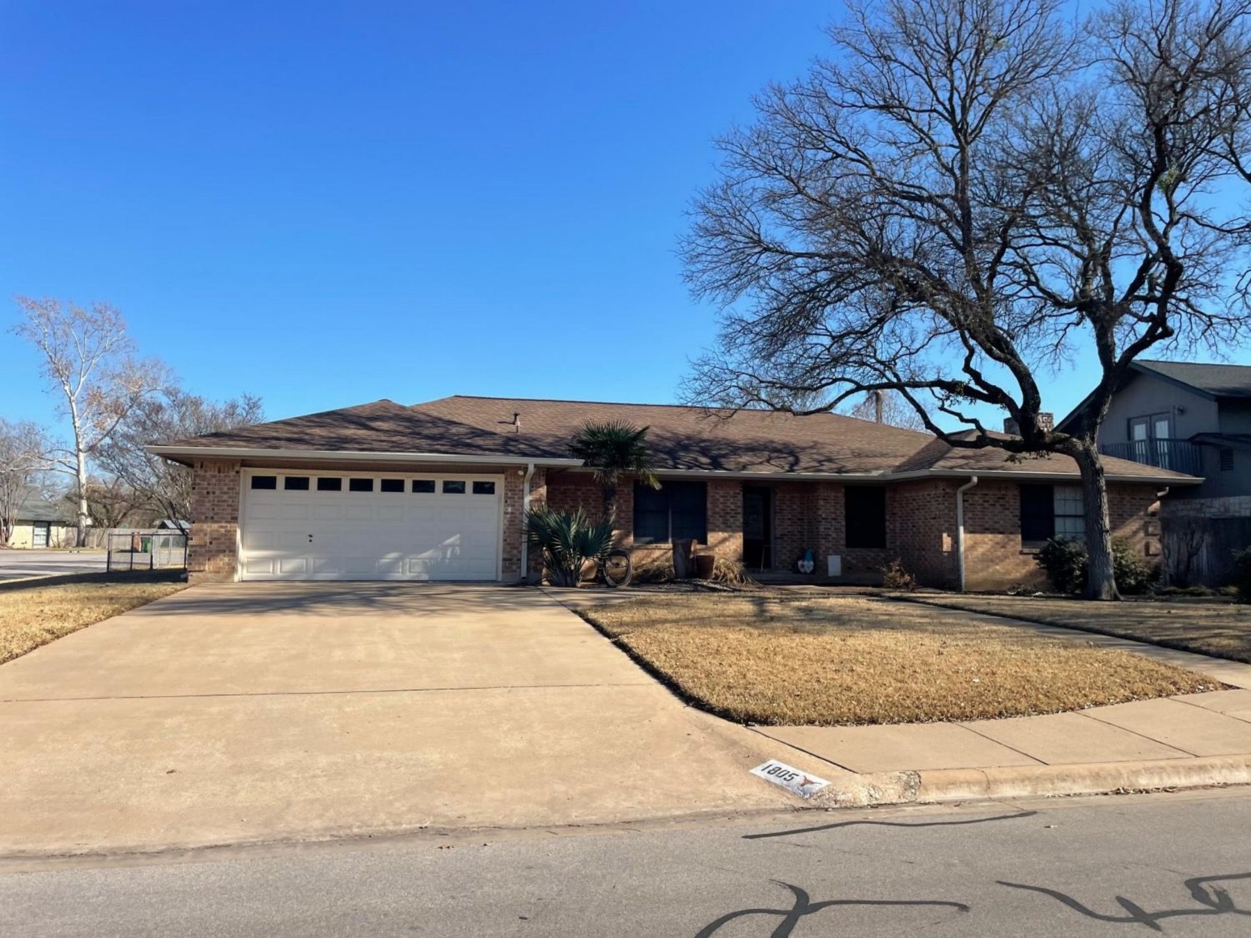 Cimarron one story red brick home round rock
