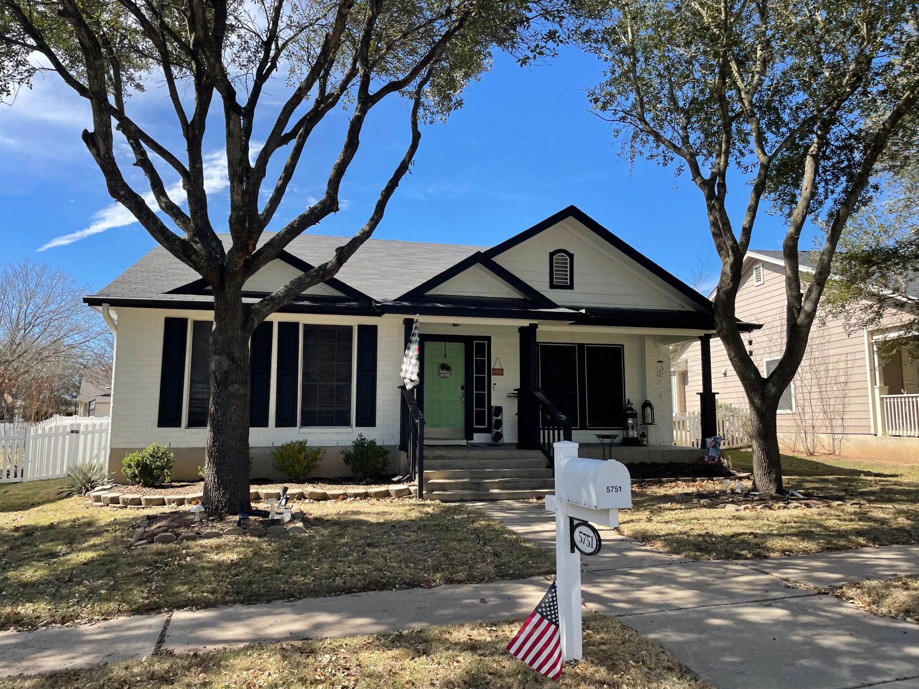 plum creek home with green door Kyle texas