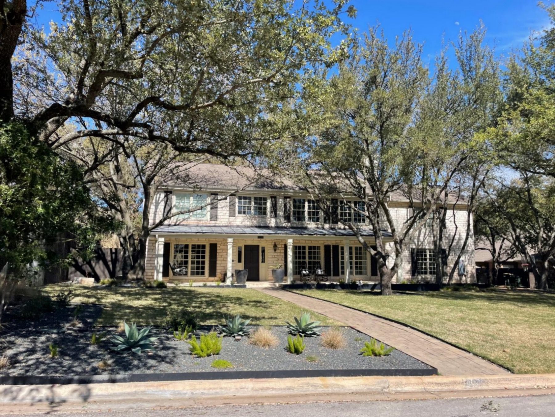 west rim luxury home with front porch in Austin texas 78746