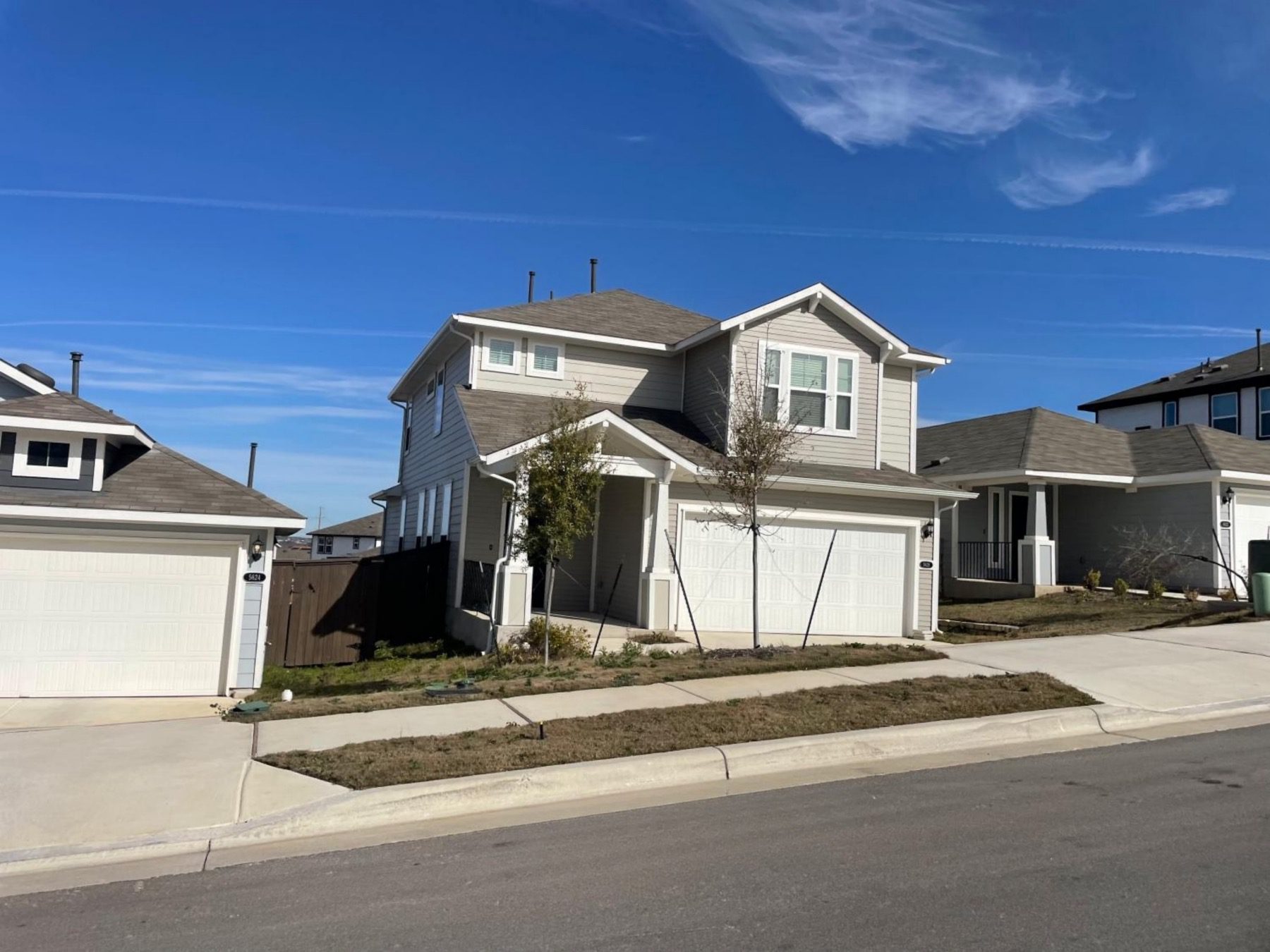 cloverleaf two story home on hill Austin 78747