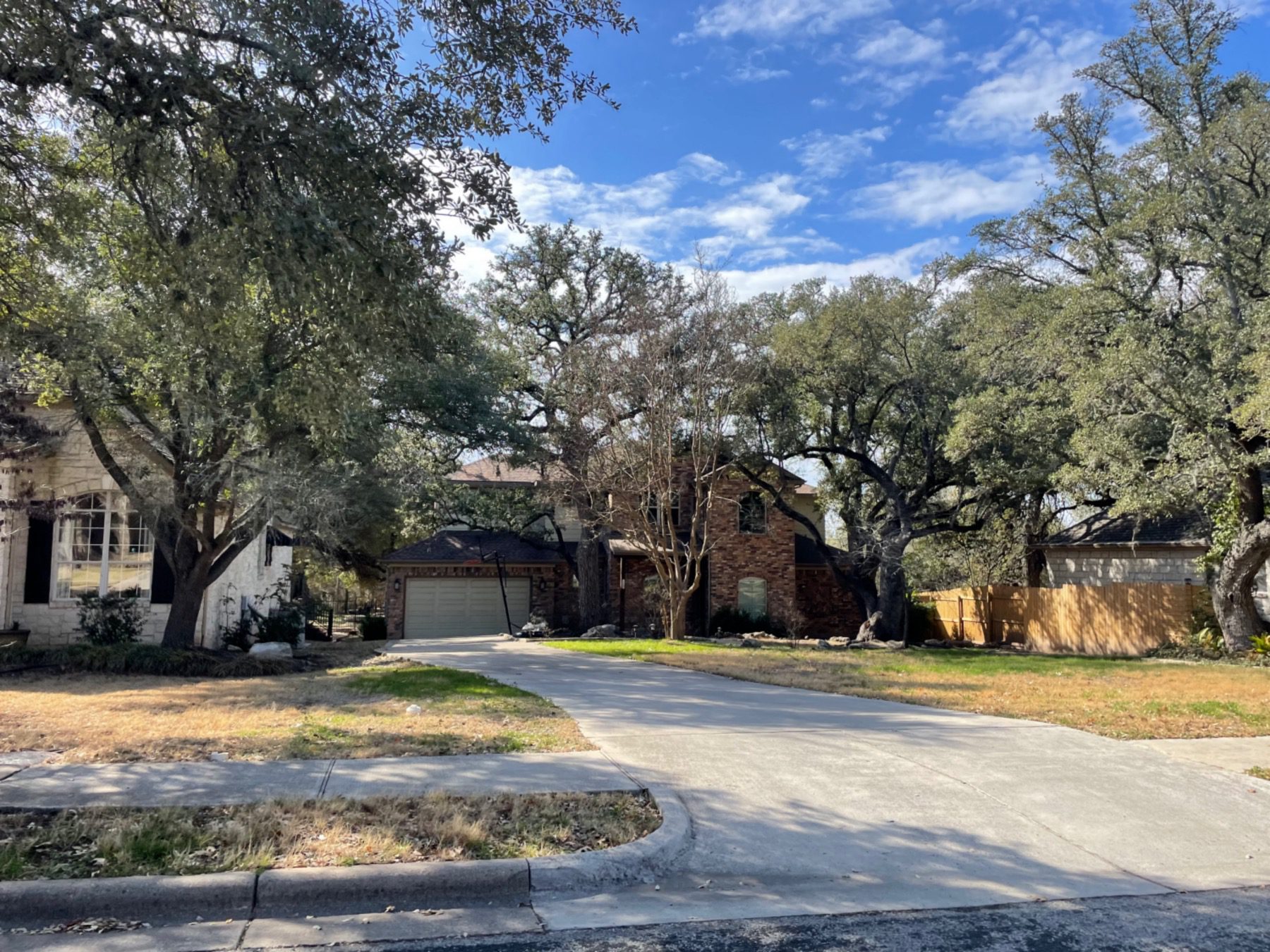 estates of Brentwood home behind street Austin 78726