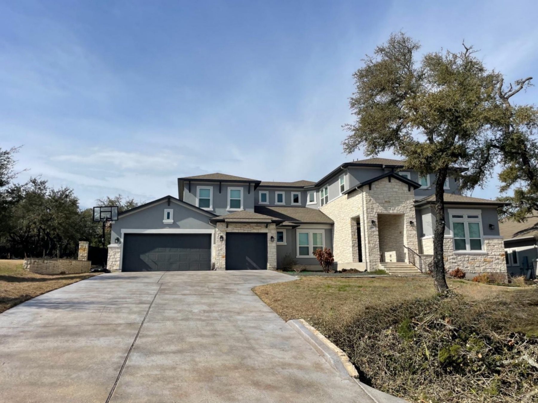 preserve at Thomas springs home with blue garage door Austin tx 78736