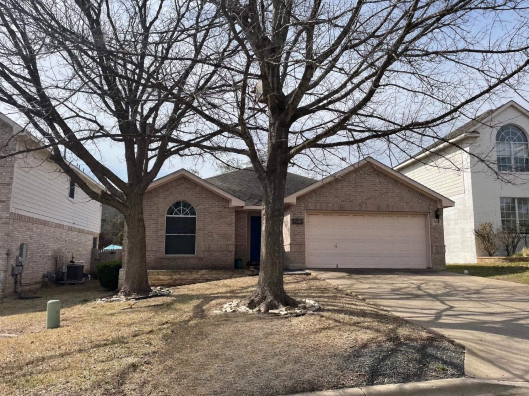 village at western oaks home above street in Austin 78749