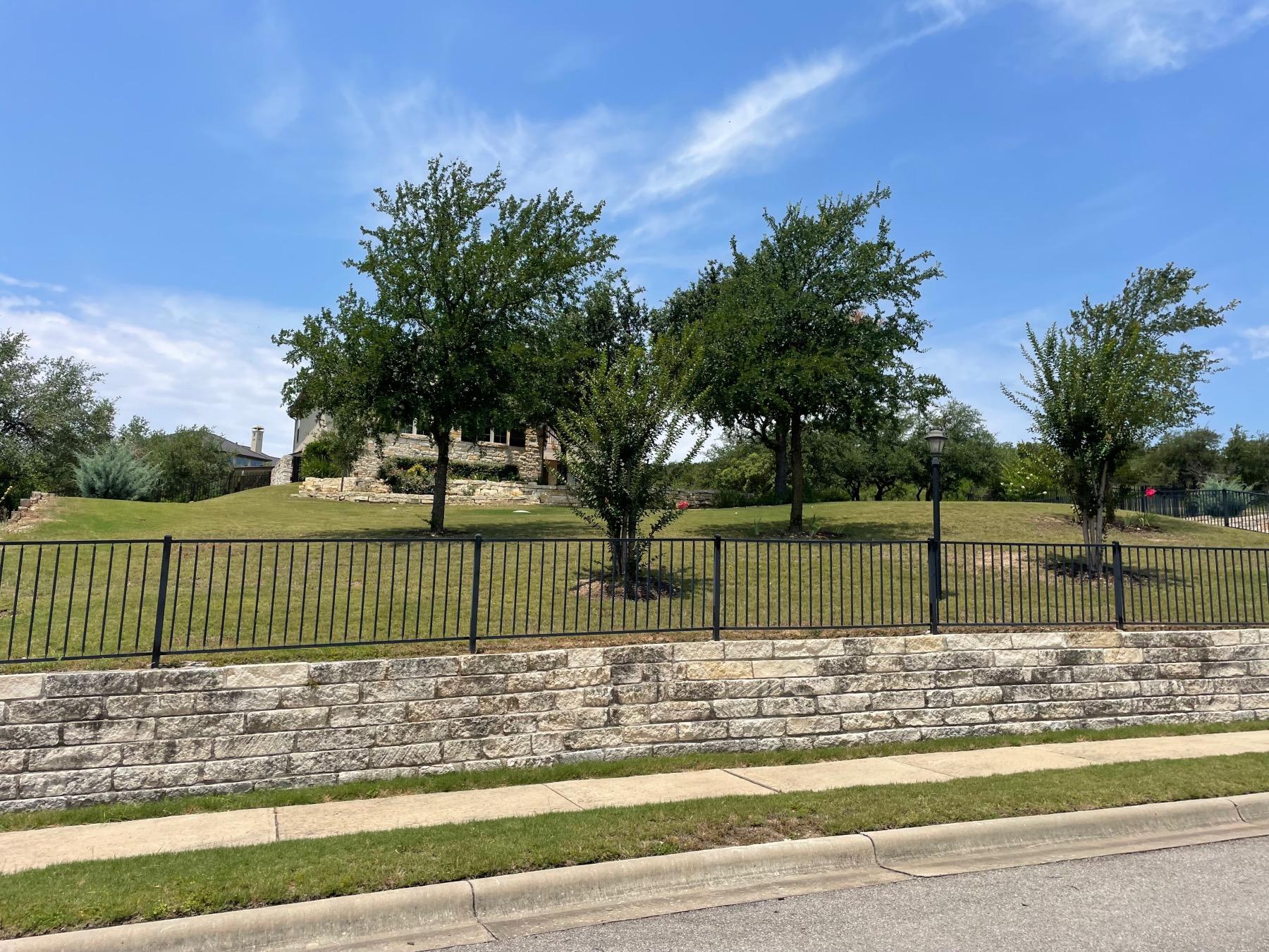 creekside at flintrock home behind fence lakeway