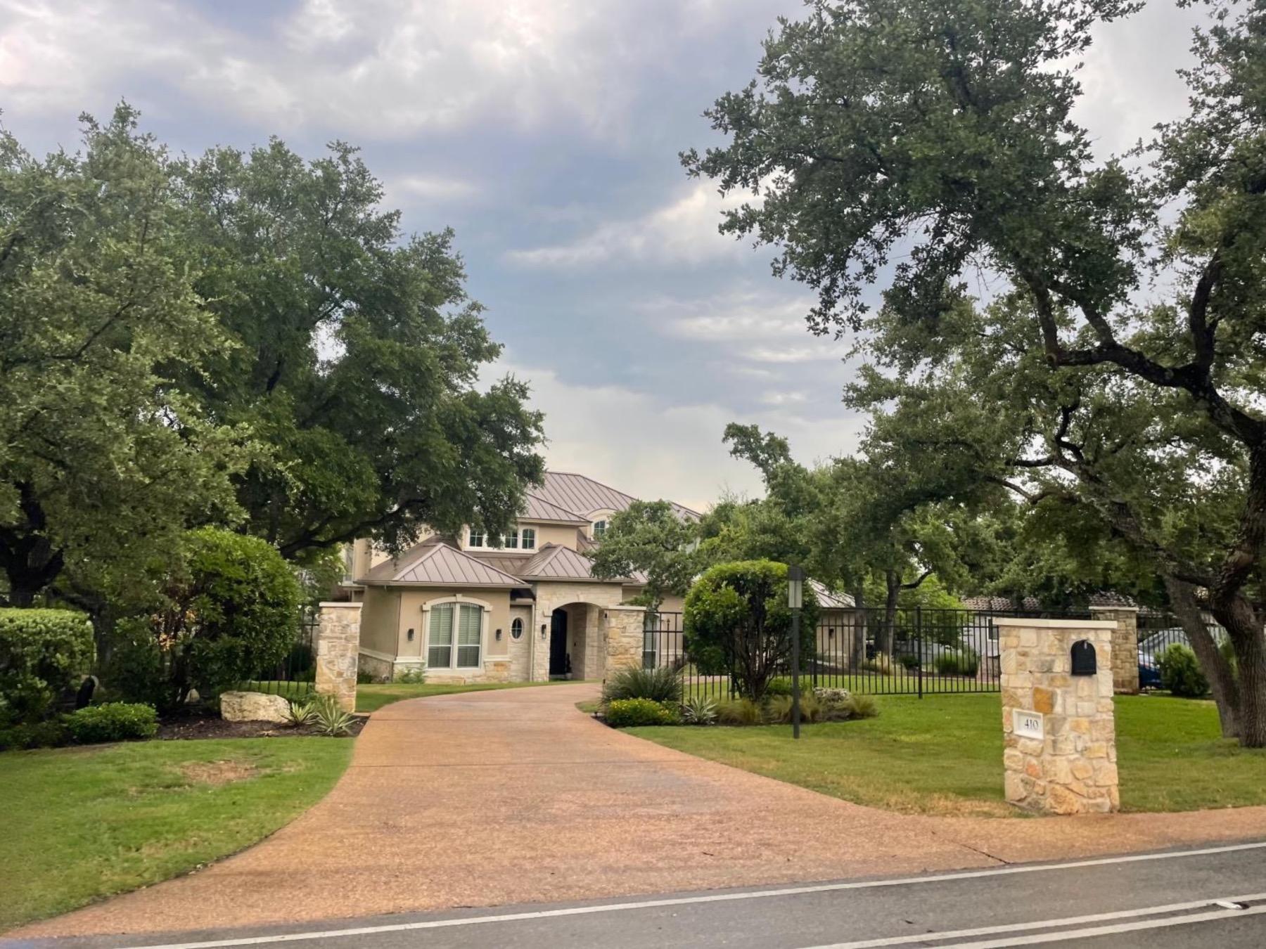 estates above hurst harbor lakeway home with circle driveway