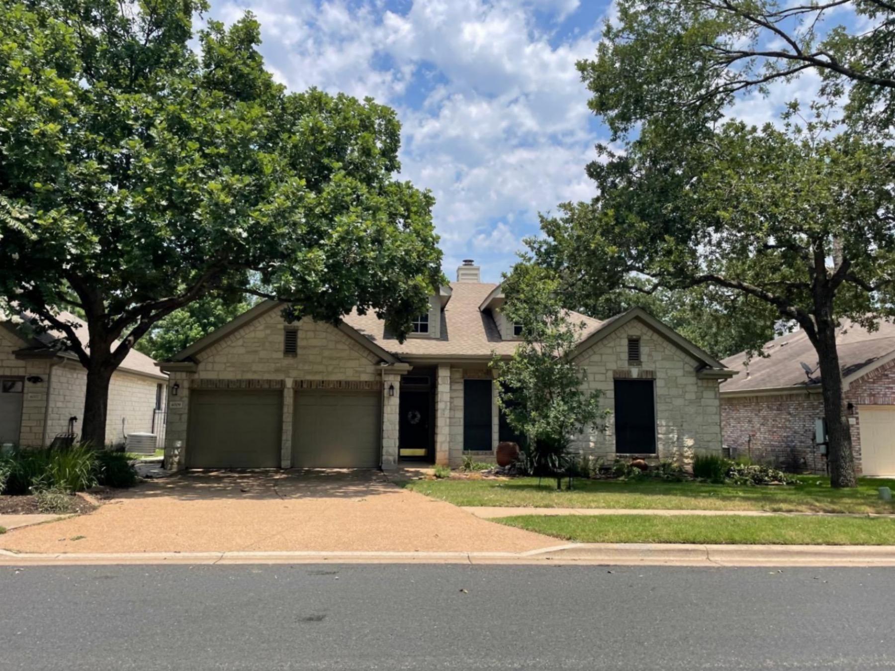 travis country one story stone home Austin tx 78735