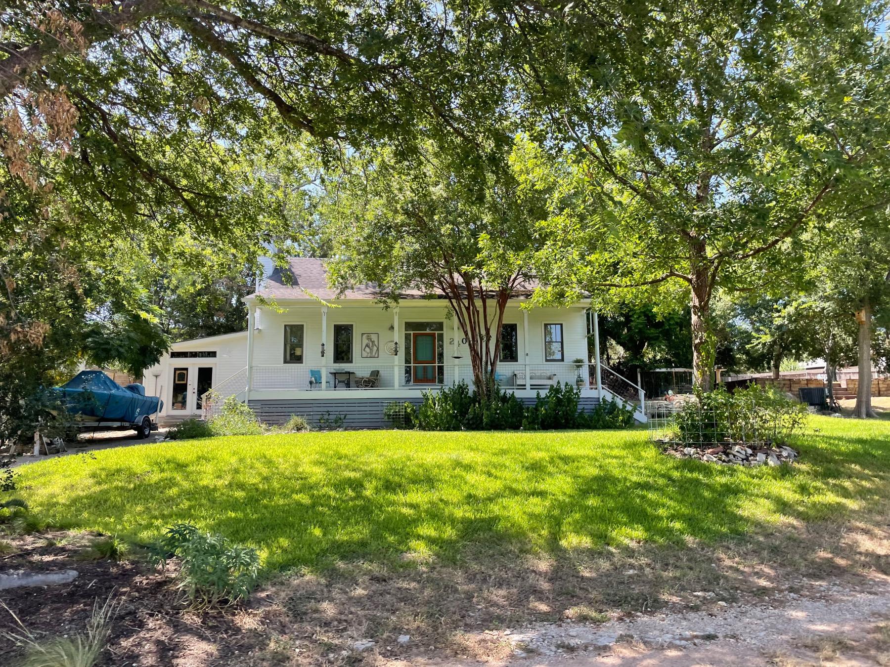 Austin lake estates white home with porch 78733