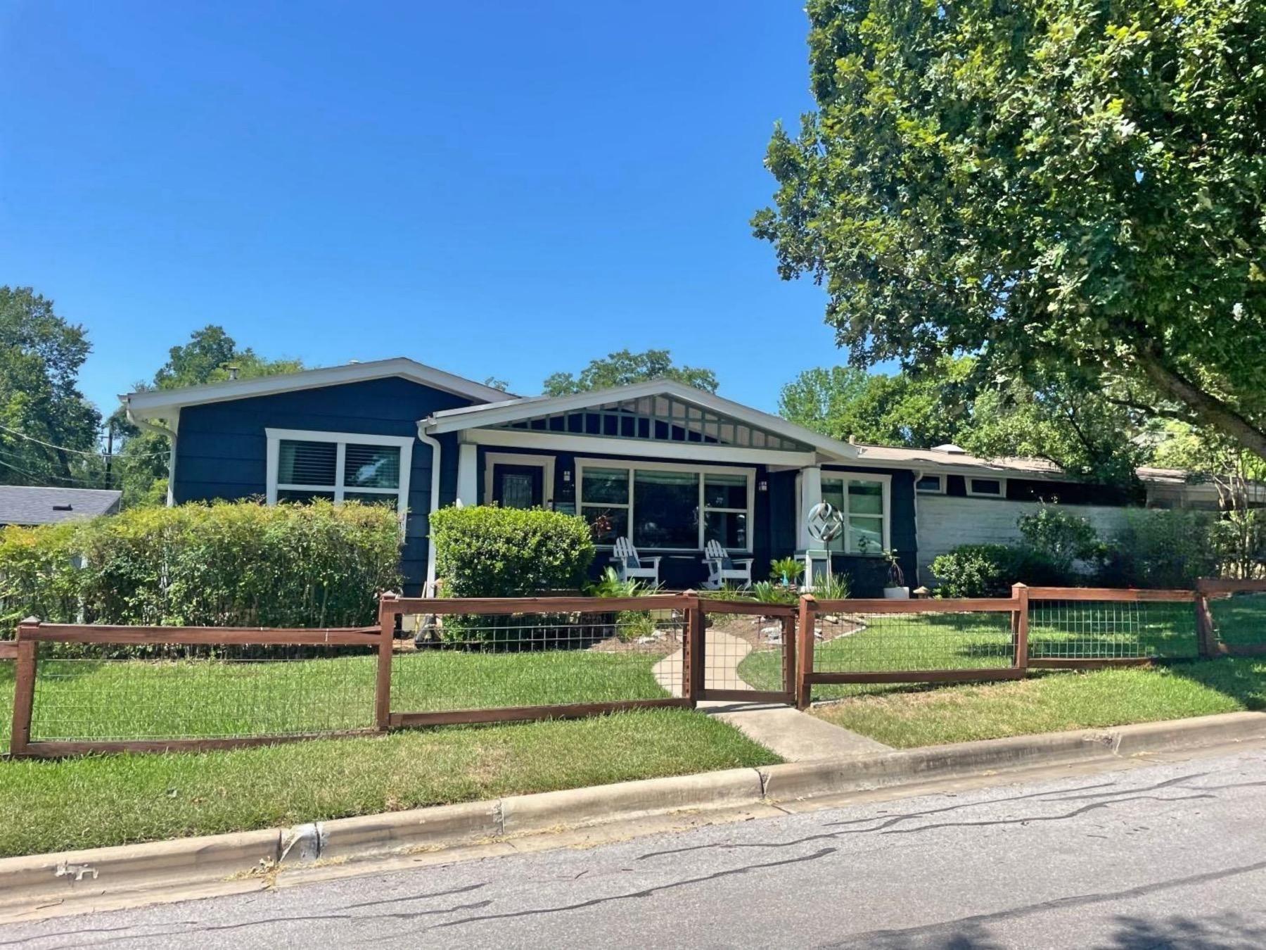 shoal village Austin one story blue home