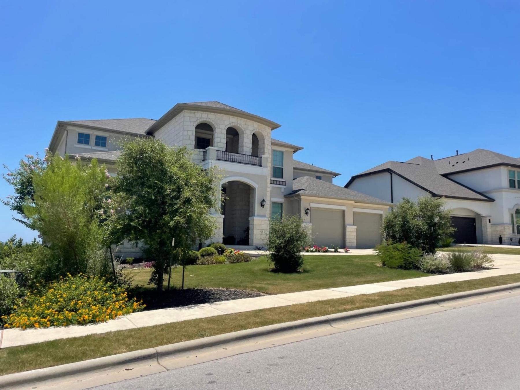 travisso leander home two car garage