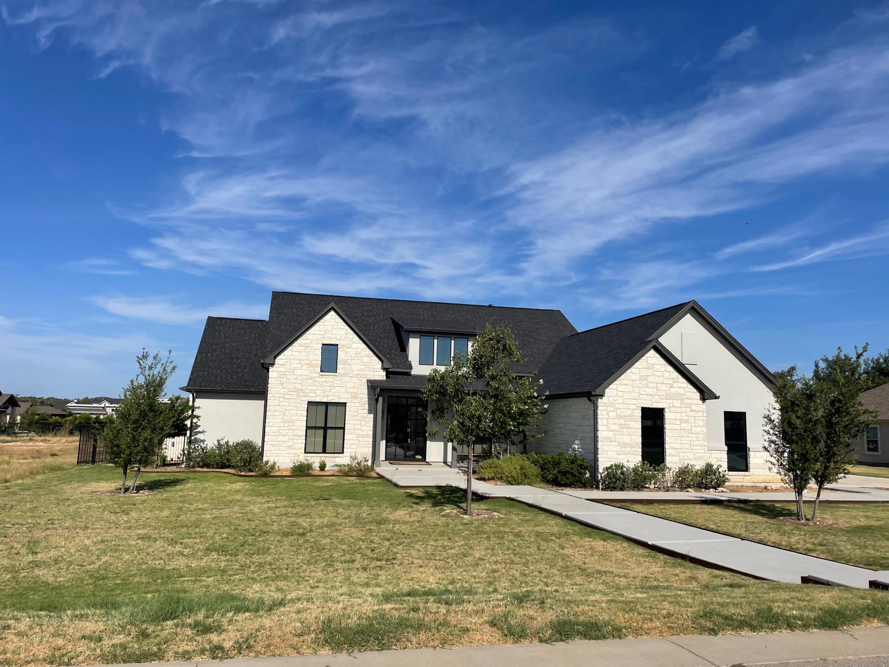bunker ranch estates one story stone home dripping springs