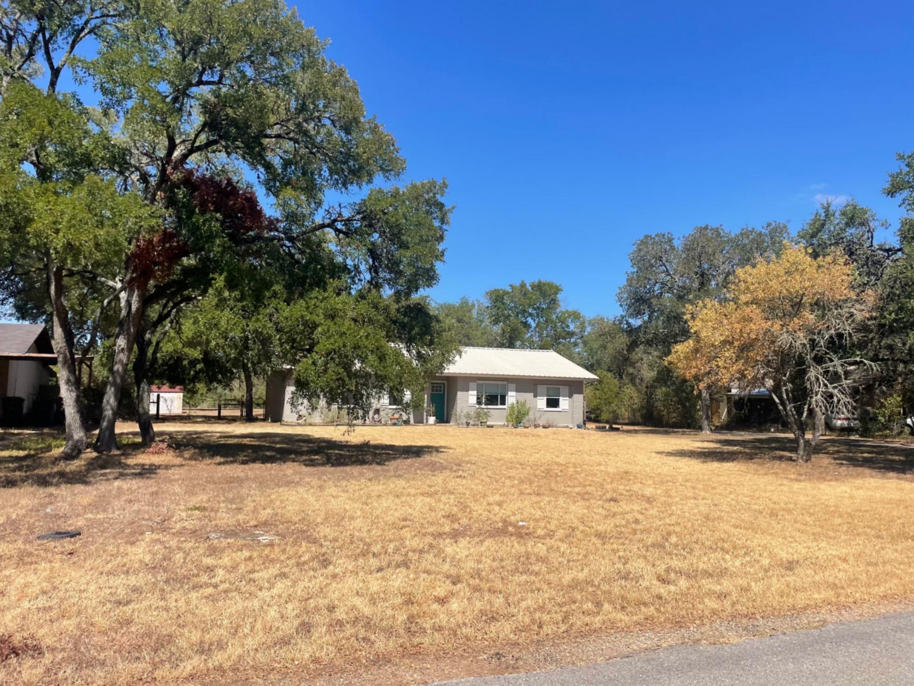 country estates home with metal roof buda texas