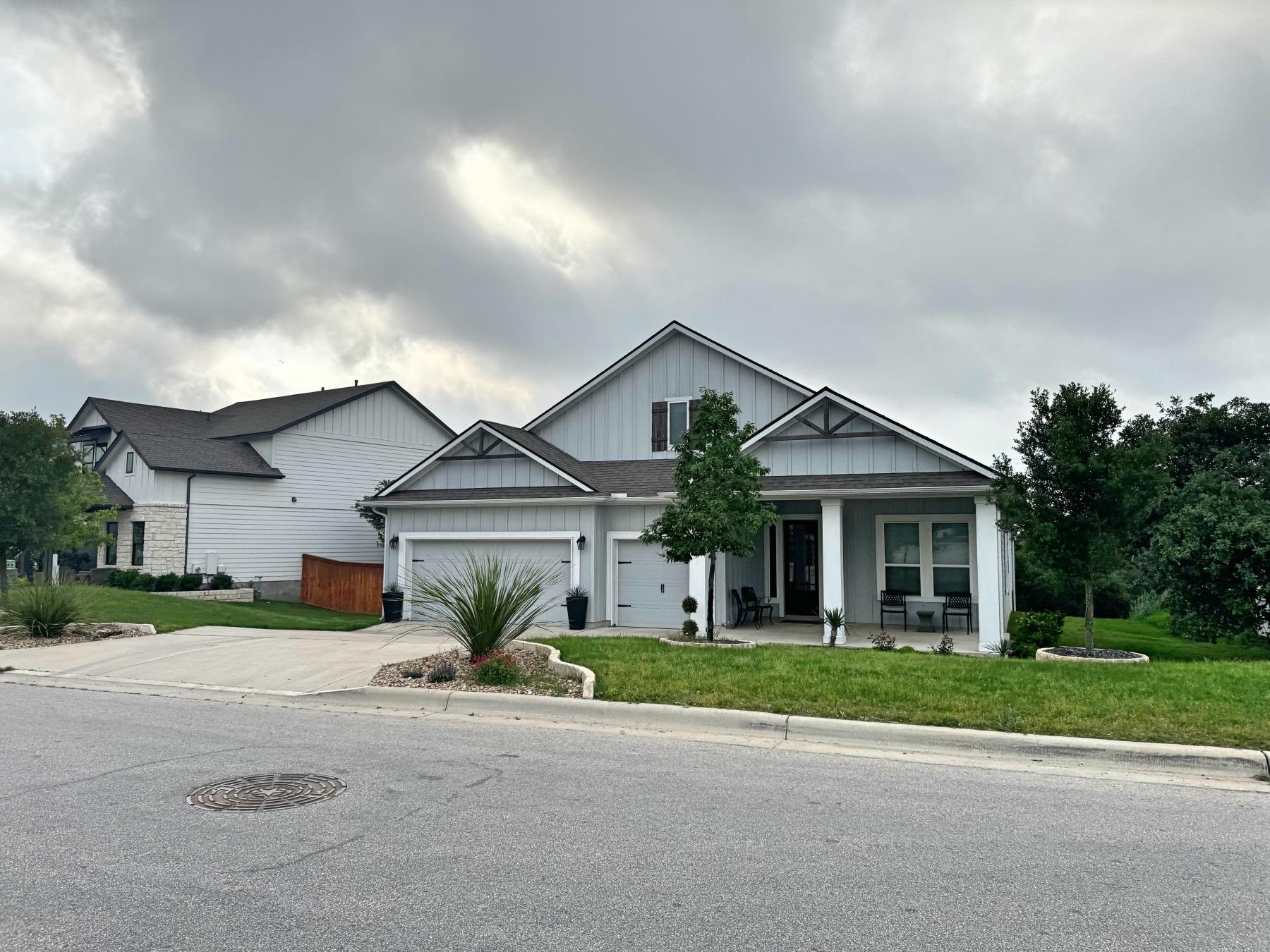 one story home with porch headwaters dripping springs texas