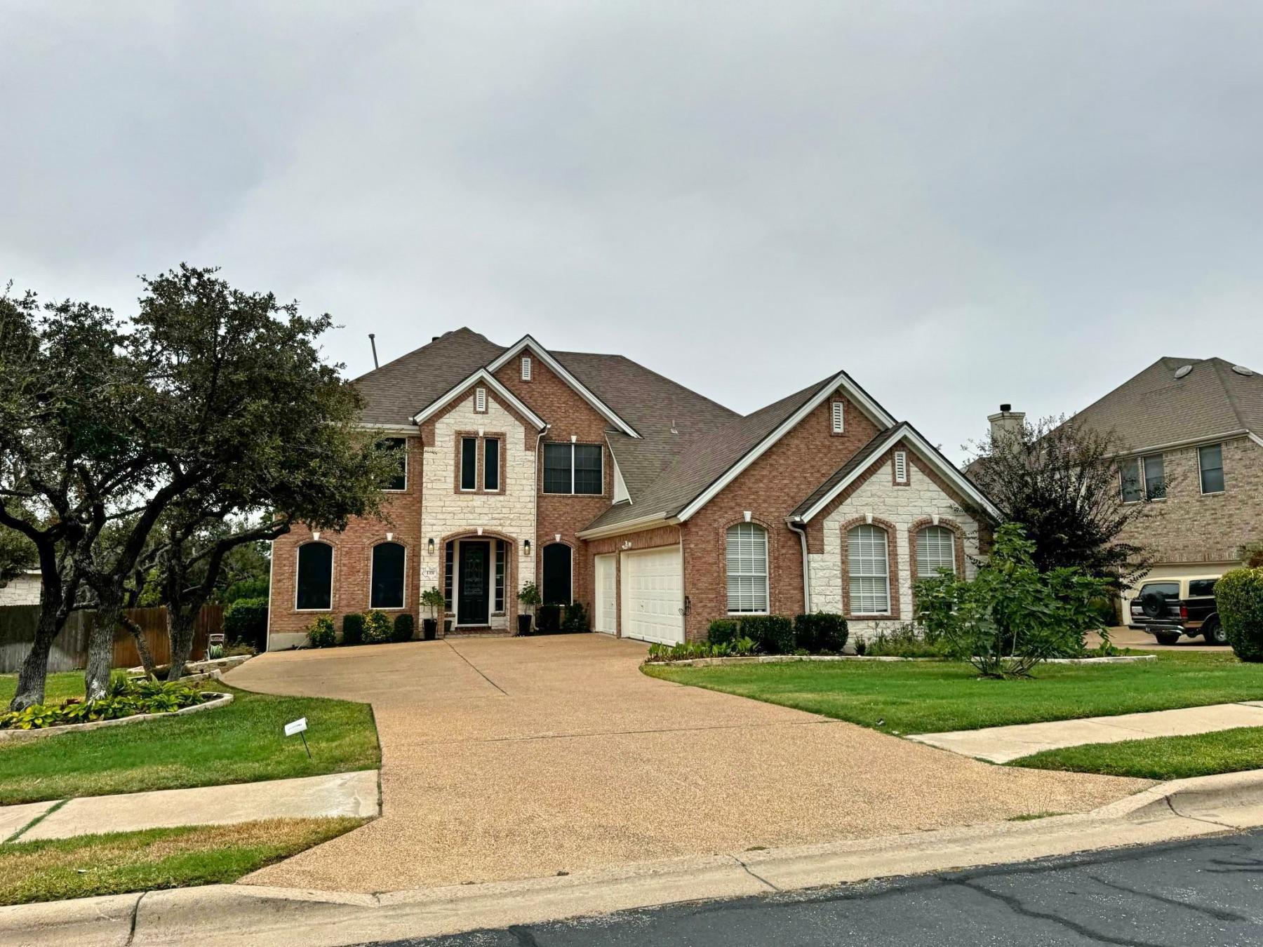 Lake Forest luxury home side entry garage Round Rock